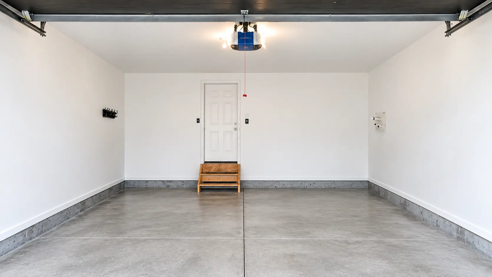 Essential Finish garage with finished white walls and ceiling